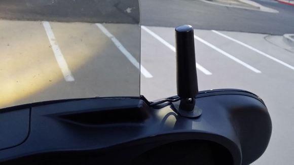 My Antenna for the Onyx, the wires run in underneath the fairing and come up through the windshield vent to the unit.