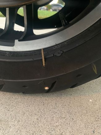 I must be crazy. Left this screw in the tire and put 5,000 miles on it. Still handles perfect 