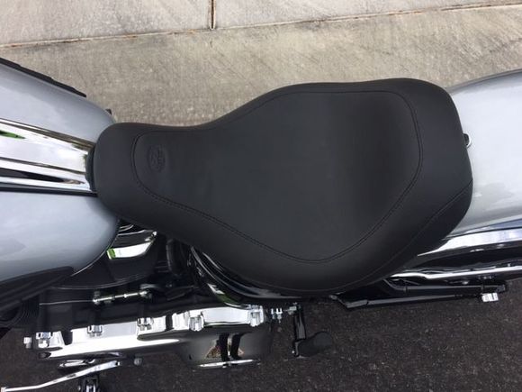 Mustang Wide Tripper. Long, narrow nose makes using foot controls and reaching for the ground easy without any chaffing of my thighs. 