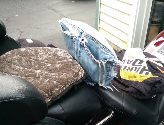 Hey, it's survived three years and over 9 thousand miles of  road trips.  And the jeans were obviously well past their prime!  No, I can't sew, it's all stapled together!