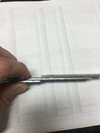 Next position the piece to be bent in a vice like so. Depending on how much of a bend you want, you might have to put 2 pieces on each side. I found that 2 pieces on each side created a bend that fit my fender perfectly.