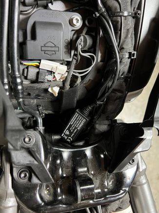 Wire switches to right side behind tank, garmin fuse is the little black box,