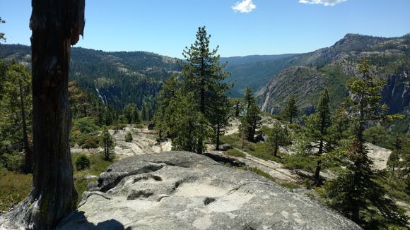 View from the Donnell Vista Point on Highway 108, east of Sonora, CA.  It overlooks Donnell Lake and currently has a couple of waterfalls coming down to feed the lake.