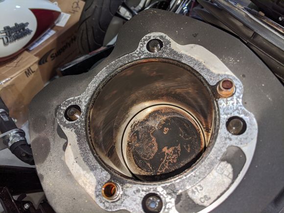 
Took a peek at the top of the pistons and was surprised that there was not a lot of carbon build up.. It still has the beaters going into the intake . I will br taking care of that very soon...
