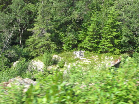 Here lies two men with their horses that were the victims of a blast.  The rock fell on them, killing them.  The rock is so big that they could not move it, now being their final resting place.  Judging from the tracks, the rock has to be about 6' thick by about 20' long and 10 ' wide.