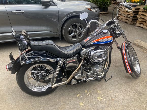 Stopped on the way back home at Cool Springs and saw this 72 Wide Glide. Spoke with the owner and says he has 211,000 miles on her. 

Pretty cool bike.
