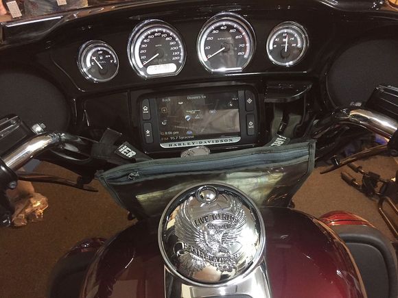 I can tuck it under between the fairing and the tank. I like paper maps to find curvy roads along rivers & streams.