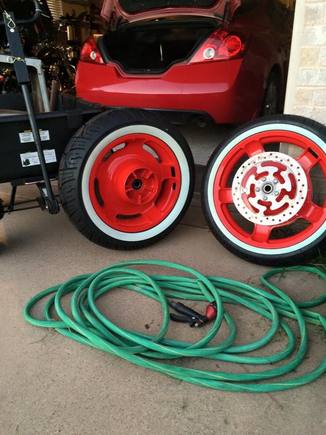 The wagon and garden hose were a gag. My brother added a front to his bike and a hose and wagon were in the background. He asked if I could see his new addition and i commented about the hose and wagon in the background. anyway, nice job on the wheels!