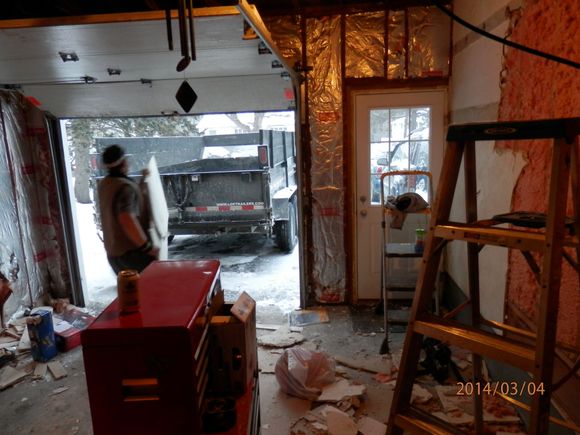 Stripping out all the old insulation etc so i could put in a ceiling and such
