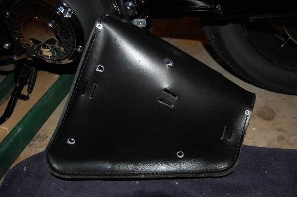 This is where I chose to drill my own attachment holes, using 1/8" leather lacing (doubled up).