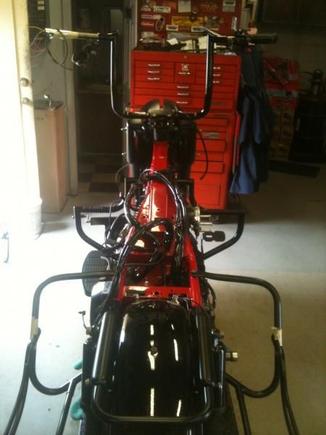 Paul Yaffee Bagger Nation Bagger Bars. 12". my other had 20 inch tall, 1 1/2 inch diameter fat apes. cross country, yeah, my shoulders hurt, but i looked cool! lol! not gonna do that again, i am building comfort into this one. also, the Linbar, in addition to the 1 inch spacers on the floor boards. multiple positions to put your feet, and with the highway pegs installed, even more positions available.