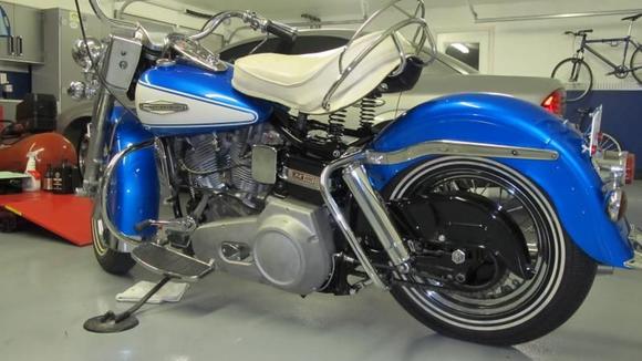 67 FLH after refurb-restoration, started the engine 11/02 and replaced the rear terminal block with an insulated piece, rejetter the carb with a larger(72) main jet from a 70 and it runs great