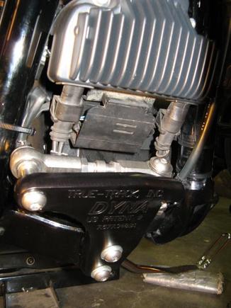 Remove two front motor mount bolts and install front TT bracket with supplied longer bolts from TT. Now would also be a good time to check condition of front motor mount and frame gap, if any. Be sure to torque new bolts to proper value. Connect stabilizer link, adj tension, tighten lock nuts. Double check everything, then take for a ride.