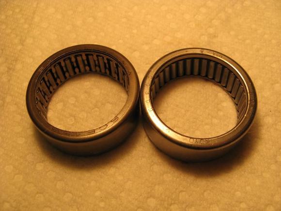 Side-by-side pic of old (left) and new cam bearings. Note number of needle rollers and cage.