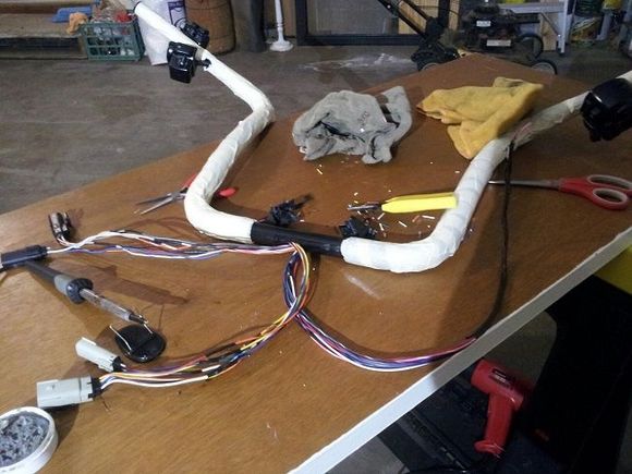 I chose to stagger-cut existing wires, insert 20" extensions, which allowed me to use the existing molex without taking the old wires out and replacing with the new wires.  In the end it was more work on my part, but I was having trouble with the molexes.  23 wires total, 46 soldered connections.