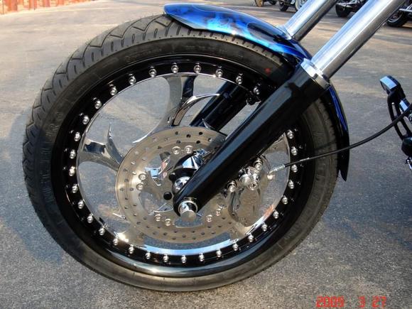 FRONT WHEEL - Left
21" Renegade Elite Multi-Piece (vs 19" Stock)
Matching Full-Floating Rotor
Powdercoated Fork Lowers
HHI Roadlock Front Caliper