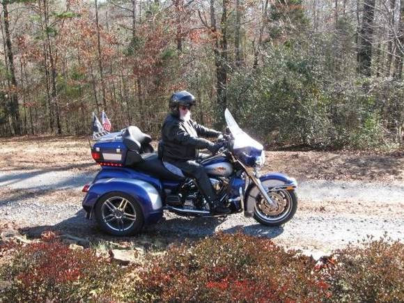 Skip's ready to go! Nice trike!! He might be santa? Nice sleigh!!!