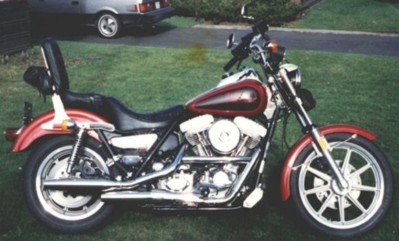 1985 Low Glide FXRS. My very first FXR....Love at first sight. Rode home in the pouring-ass rain. Leathers weighed about 50 pounds when I got home and I had a grin that didn't come off for a week 8^)