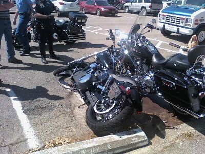 Bike hit and knocked over at work