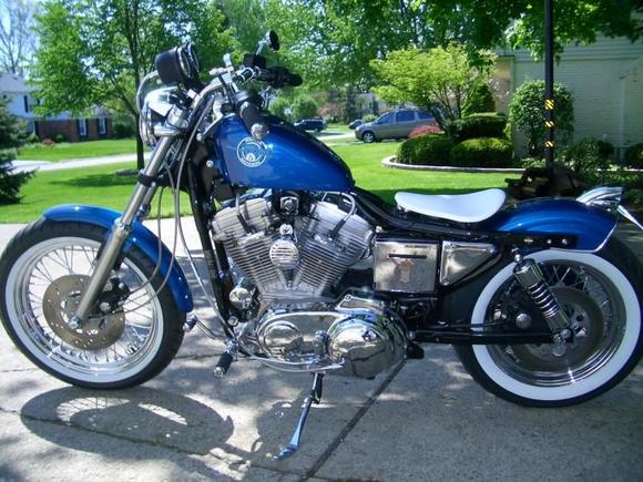 '92 Sporty, oversized wide white walls, chromed engine, chopped rear fender, 10" shocks, 6" T Bars.
