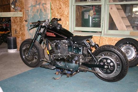 mocked up bars, new seat/mounts, struts chopped, progressive lower shocks, spoked rear wheel with new tire, more to come