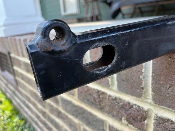 Spacer wore into swingarm.  Will repair/reinforce.