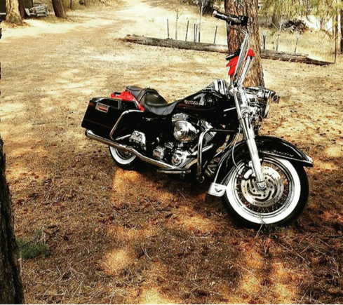 The Road King is the best touring bike for that look. They make apehangers that work with the bat wing on the Street Glide etc, but they really don't pull it off the same way in my opinion. 