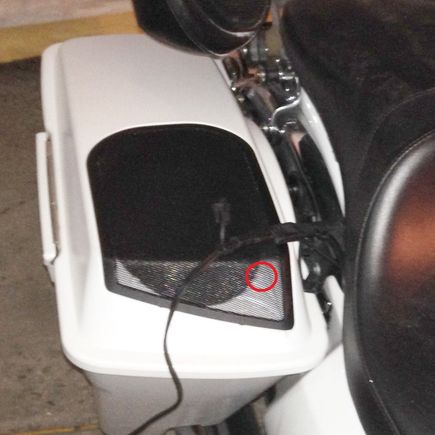 The Red Circle denotes the screw that is missing...