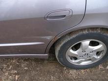 back seat driver side door ding