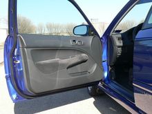 Driver side door.  Light reflections are making the whitish marks on door panel.