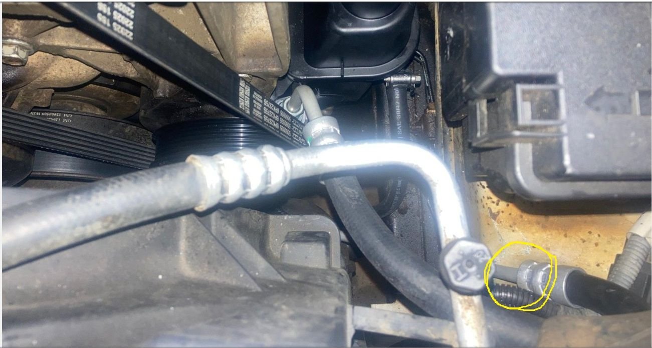 See this area of the pressure hose circled in yellow?  In my setup, this part of the hose is rubbing against the sheet metal next to it, which could potentially cause a power steering leak.  I plan to mitigate this by wrapping the exposed metal piece of the hose with some rubber return hose, then using either zip ties or worm gear clamps to hold the rubber in place.  