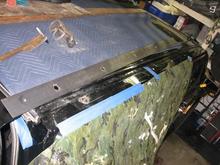 Reinforcing plate ready to be epoxy bonded, fastened with (50) 5/32 stainless blind pop rivets, then welded to 6mm roof rack rail nuts (12) places. This sucker is never going to fail again!