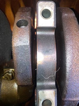 Bearing Caps: Pay Attention to the number, as well as the direction of which way to install them.  The arrow is pointing towards the FRONT of the engine.  