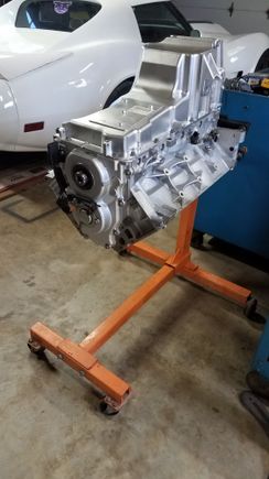 Oil pan installed along with VVT actuator, Cam position sensor and harness mounted