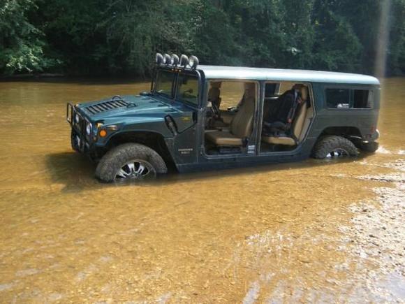 once i broke the surface sand, the truck just literall sunk until the rear bumper was on the creek bed.