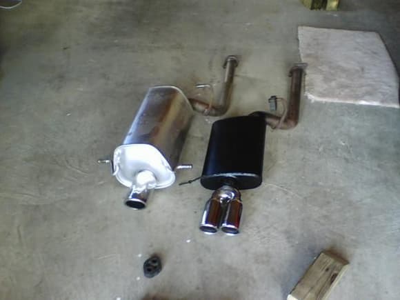 Custom Exhaust.  Summit Racing Muffler, Magnaflow tip, and the tail end of the original muffler.  Welded all together it is a $75 muffler that fits the stock hangers, can be quickly swapped if needed and sounds just right!