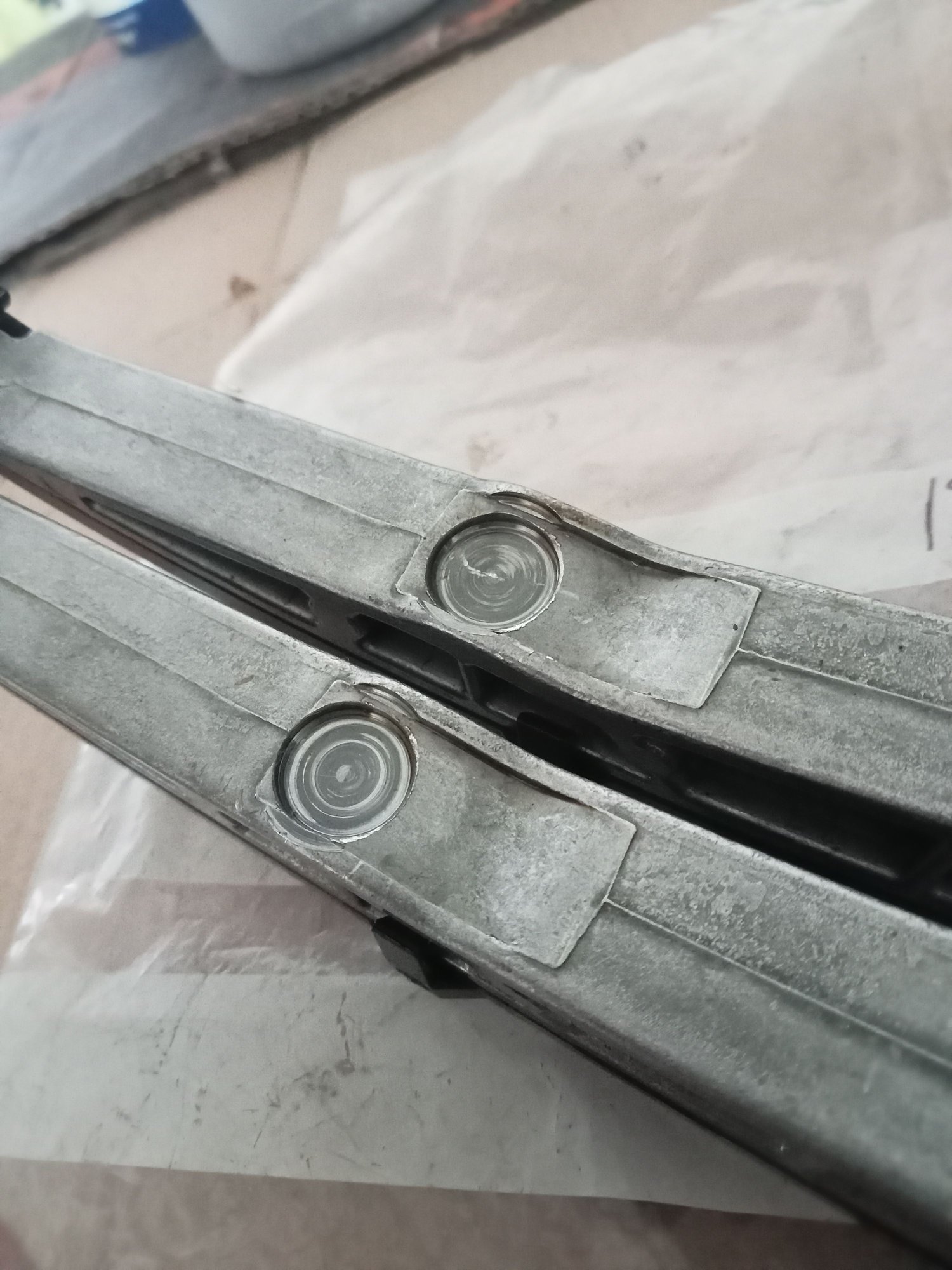 Typical wear where tensioner bears on blade.