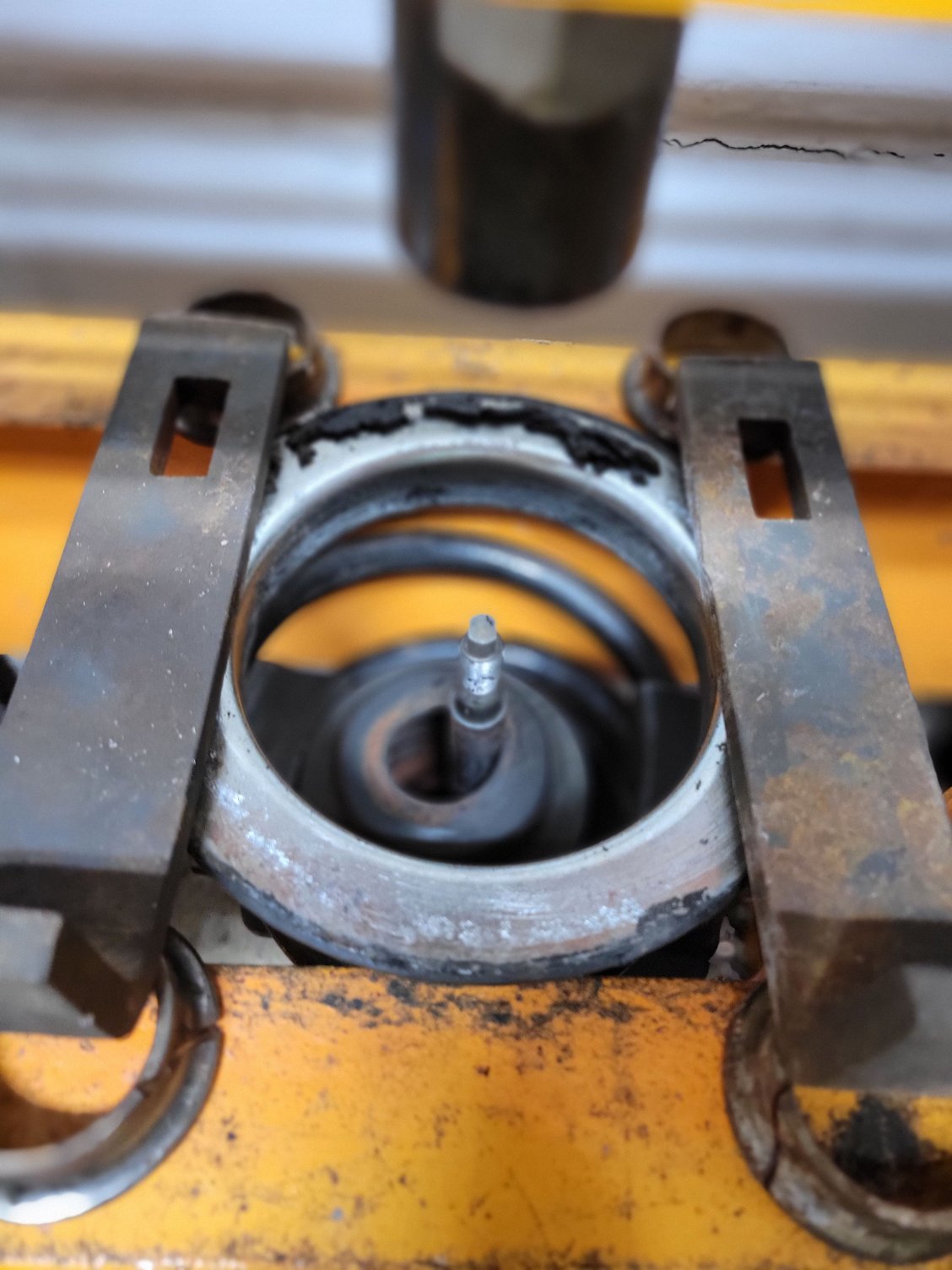 Strut top mount top plate removed to show the result