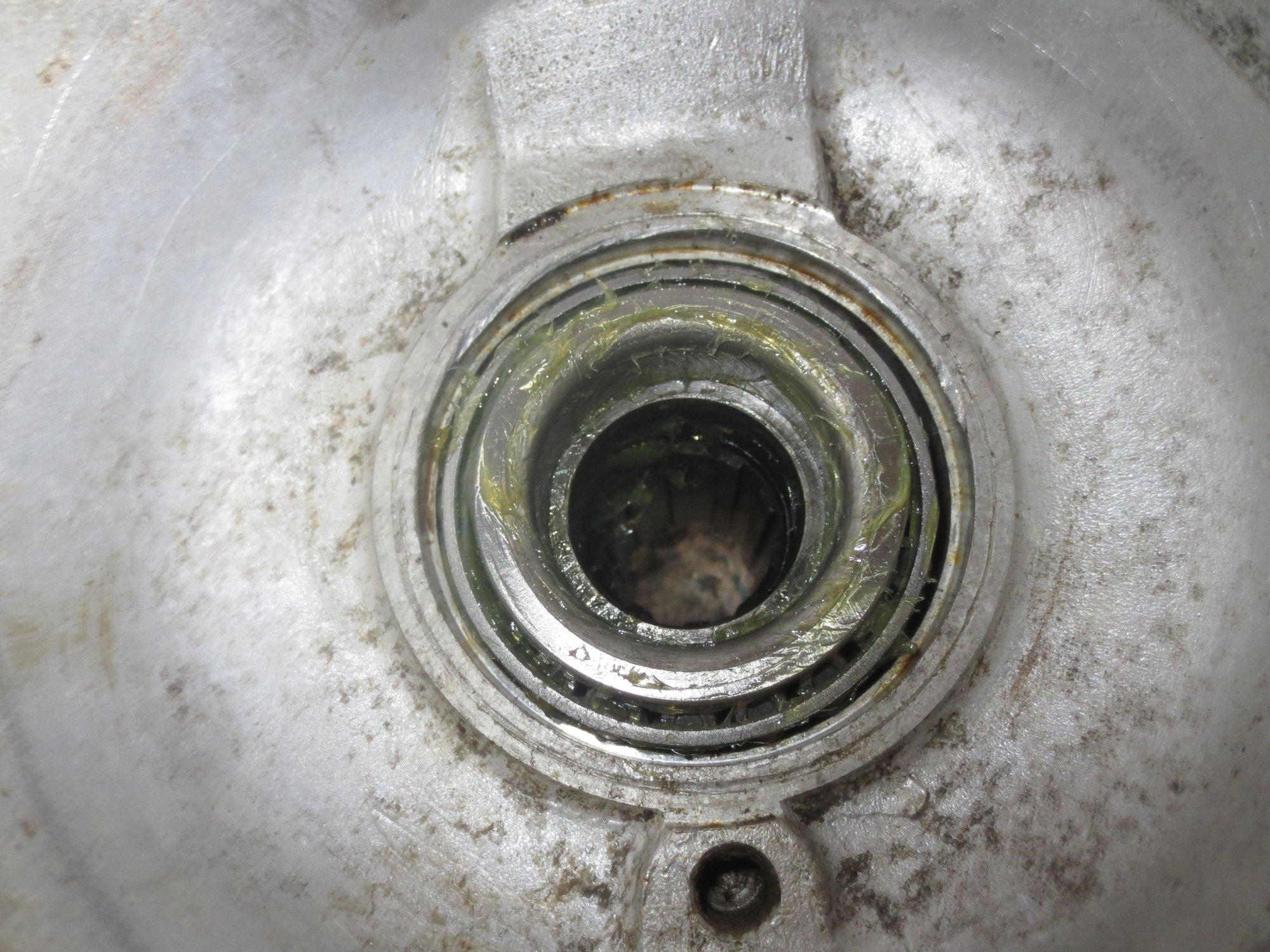 New inner race of the inner hub bearing partially drifted into place on the hub tube.