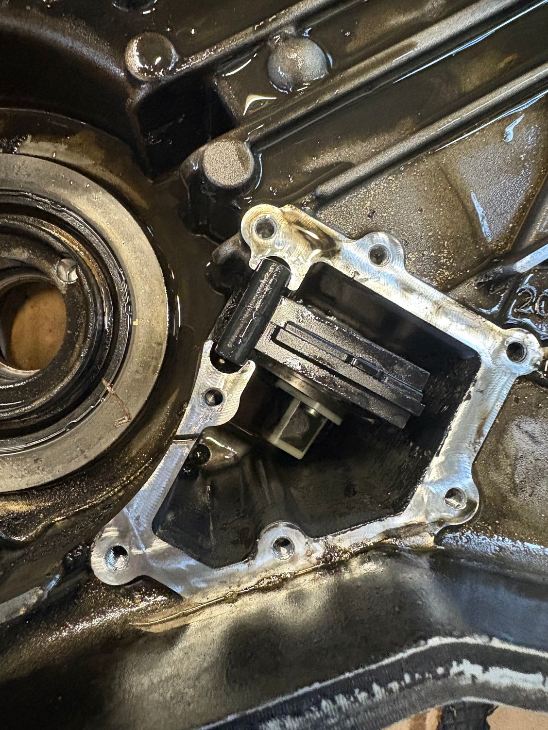 Oil drains down into pump pickup area