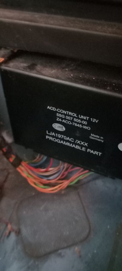 I'm assuming this is the module for the suspension?  Exactly wherebyou said, in boot behind wheel.