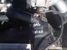 This is the "correct pump and connector". It is a Hella. It is just sitting on top of the radiator prior to me installing it.