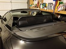 close up of wrapped top cover trim- gloss black to match paint 