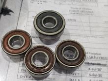 The old bearings will be destroyed. There are 6 pulleys in the XFR belt drive system, 5 are metal and 1 is plastic, only the metal pulleys have replacable bearings.