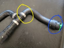 Suggestions on how to disconnect and reattach from yellow circle.   I have identified a leak coming from from the old hose at the blue circle connector.   I have disconnected the blue circle connector already.  I dont have the ability to change the entire assembly.  Even if its rigged somehow, I would aporeciate any help on this one.    Any ideas at all....