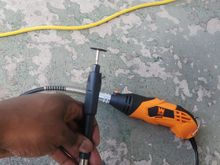 My rotary tool. Could not find my Dremel and purchased this WEN brand. I must say, I'm pretty impressed for $35. Came with many accessories as well. Extension, light ring attachment, cutting guides.