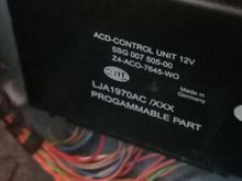 I'm assuming this is the module for the suspension?  Exactly wherebyou said, in boot behind wheel.