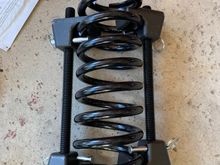 The strut compression tool I borrowed.  Note the shock is not included so I could better show the large clamps