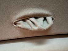 Pocket untucked to show. 