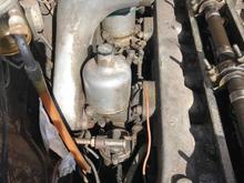 Pre-restore showing front carb but no auto linkage that I can see.